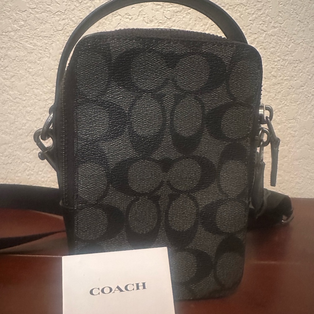 Coach crossbody in black, worn twice.